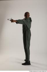 ERIC PILOT STANDING POSE WITH GUNS